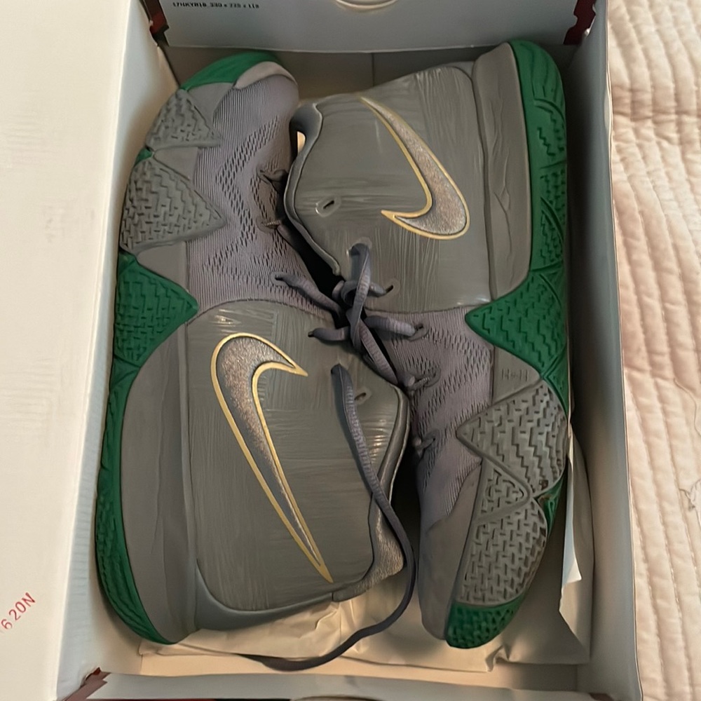 Kyrie 4. Worn once, didnt fit, sitting in my closet.